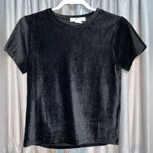 Eye candy, size medium, black velvety material